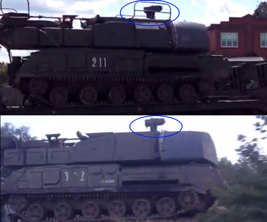 The top image is an example of a Buk with railings. [Source] Bottom image: the Buk with the markings outside of Staryy Oskol. [Source]